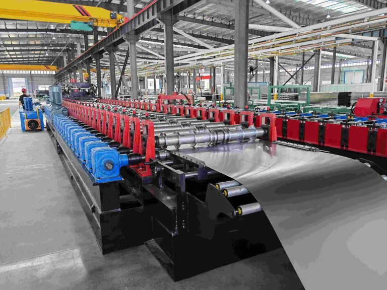 Precision feeder unit with gear box transmission on Carriage Board Roll Forming Machine.
