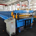 Hydraulic final cutter of the Double Layer Roll Forming Machine, designed for two distinct metal panel profiles.