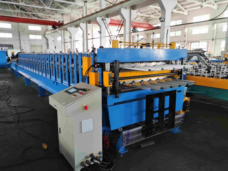 Hydraulic final cutter of the Double Layer Roll Forming Machine, designed for two distinct metal panel profiles.