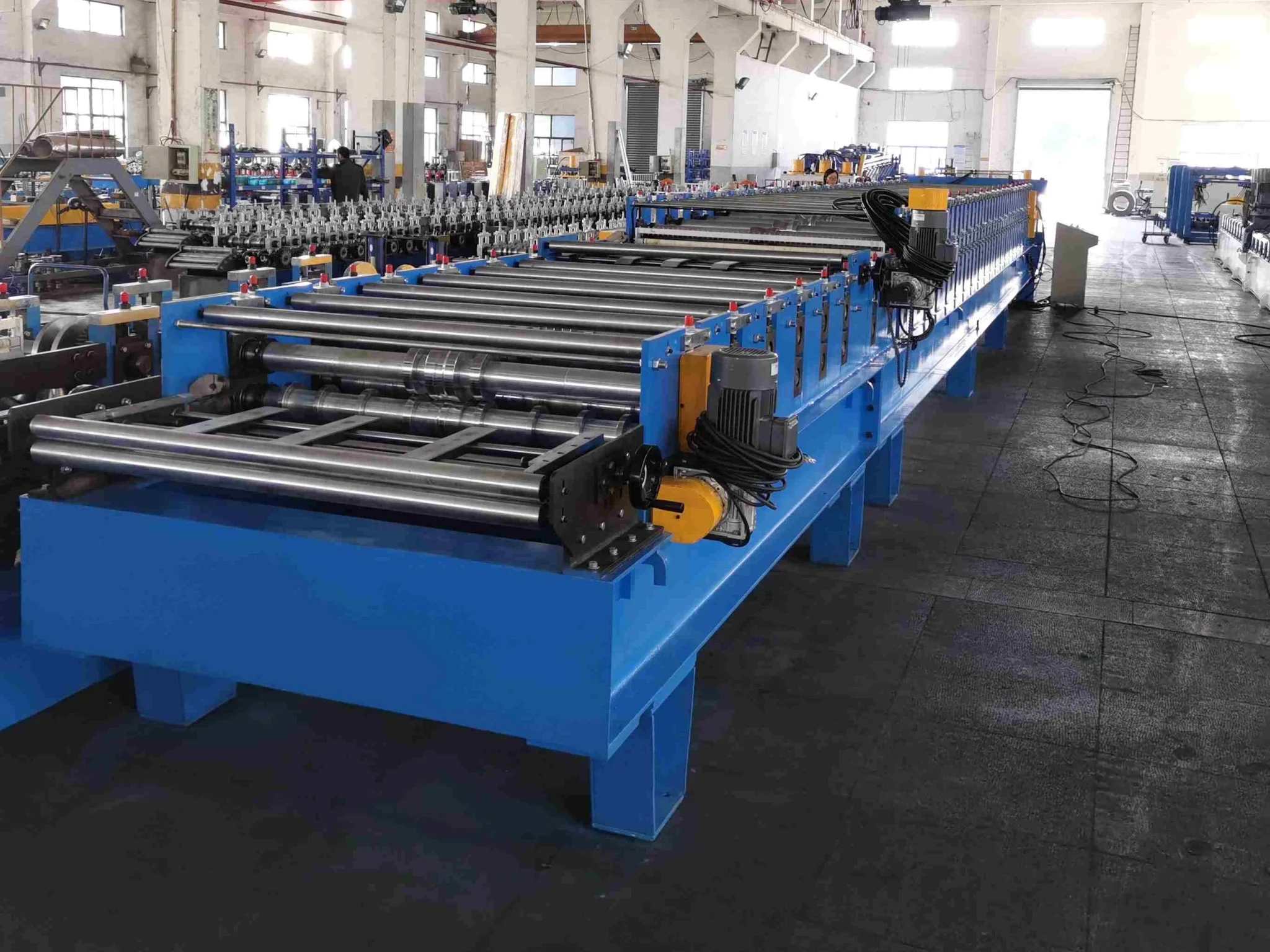 Roll Forming Machine Feeder and Pre-cutter section of the Double Layer Roll Forming Machine.
