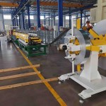 Double header uncoiler supplying material to a medium speed strut channel roll forming machine.