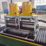 Flying punch holes device integrated with a medium speed strut channel roll forming machine.