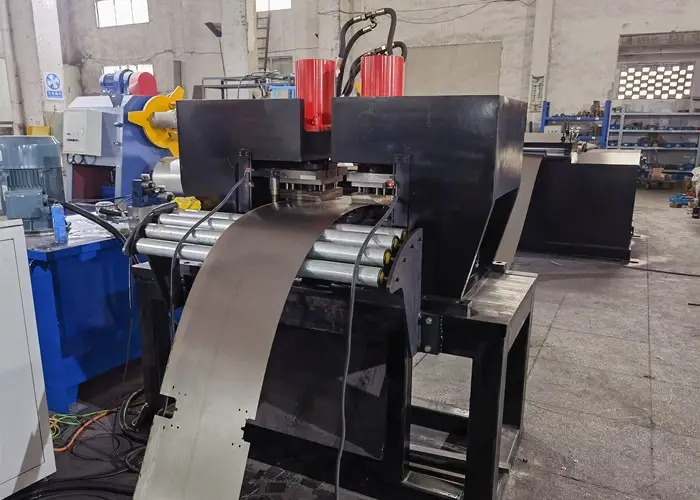 Close-up of the integrated CNC Shelf Panel Roll Forming Machine Puncher and Notcher station.