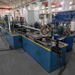 Precision Flying Punching Device on the LGS Framing Machine ensuring accurate hole and slot placement on the moving C-stud profile.